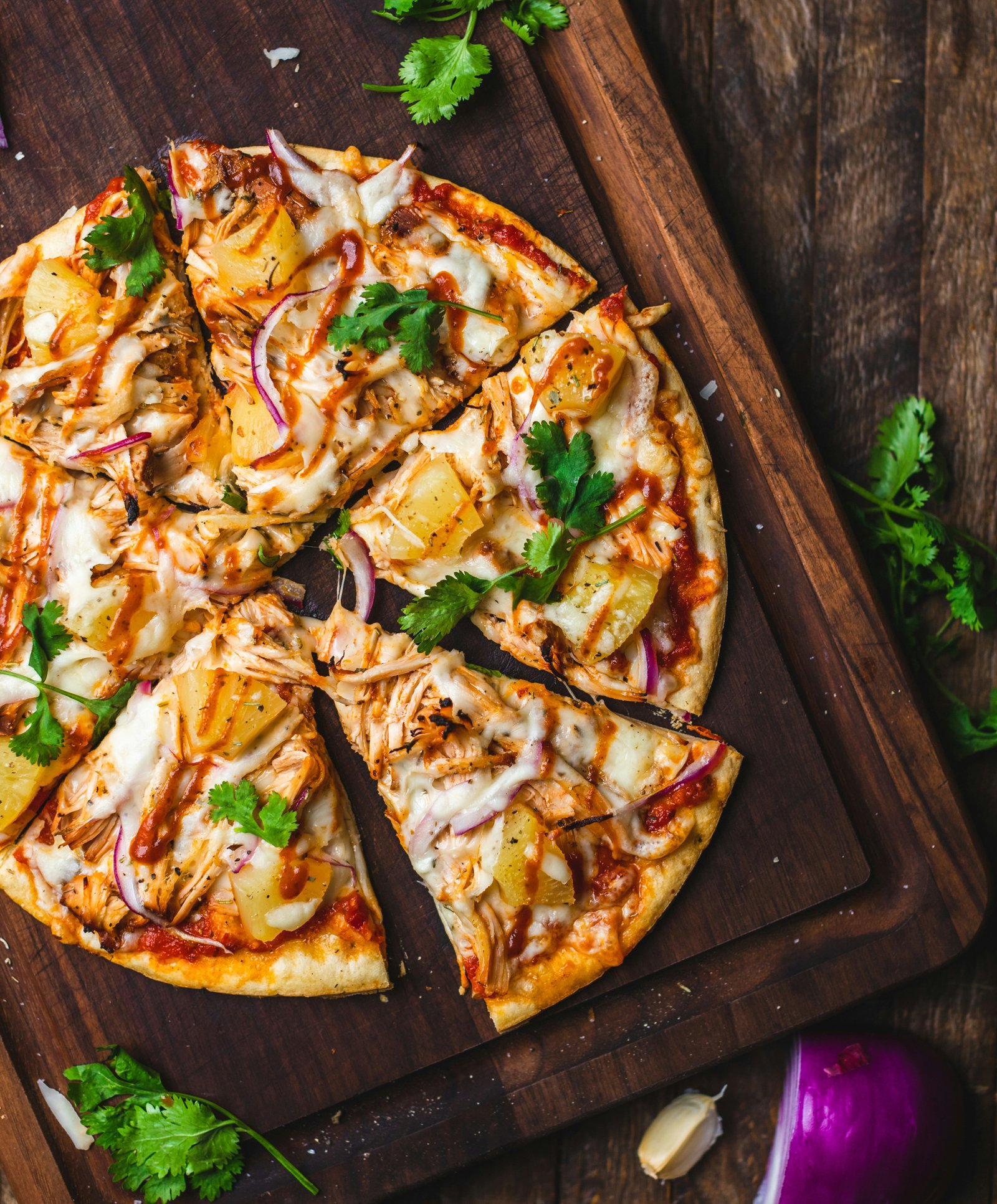 stretching pizza dough into round shape