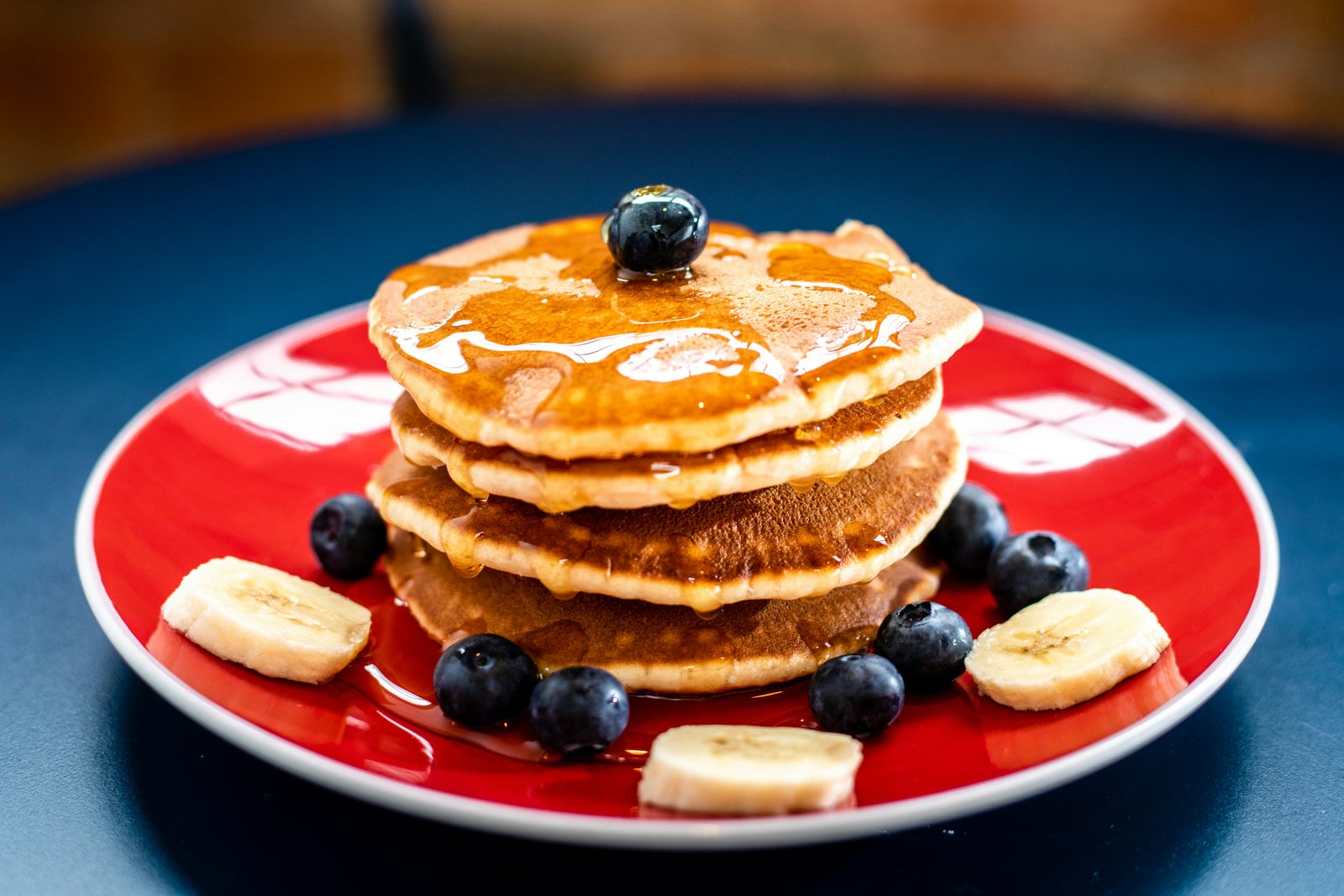 cooking pancakes on hot griddle pan